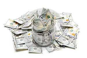 Dollar bills in glass jar on white background. Saving money concept