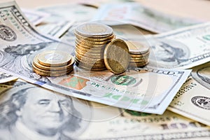 Dollar bills laid out on table. Three different columns of coins, 20 cents coin, financial crisis, money, finance