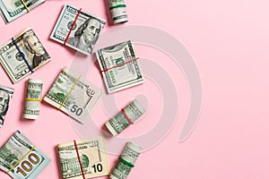 Dollar bills. Pile of one hundred US Dollar Bills money on colored background top wiev with copy space for your text in business