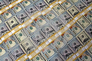 $100 dollar bills stacks - stacks of money on the table photo