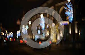 Dollar bokeh on city streets. Abstract financial background with many dollar symbols