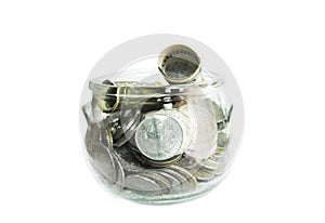 Dollar coins in a glass jar on white background. Saving money concept.