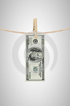 Dollar hanging on a rope