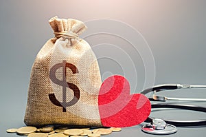 Dollar money bag and stethoscope. Health life insurance and financing concept. Funding healthcare system. Reforming and preparing