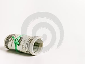 Dollar money roll isolated on white background.
