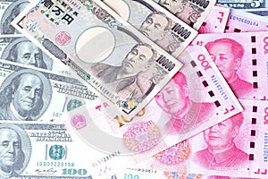 Dollar money ,USA banknote ,Yuan Banknote ,Chinese banknote and Yen banknote , Japanese Banknote lay spread double