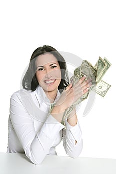 Dollar notes in happy brunette woman hands