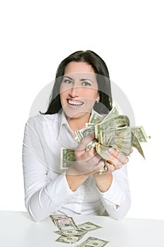 Dollar notes in happy brunette woman hands