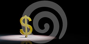 Dollar Sign Shape Spotlighted on Black Background photo