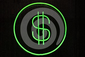 Dollar symbol green glowing neon isolated on black