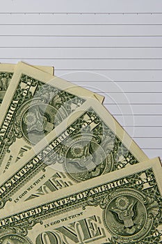 Dollars banknotes on notebook for financial concept