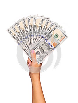 Dollars bills in female hand isolated. Money