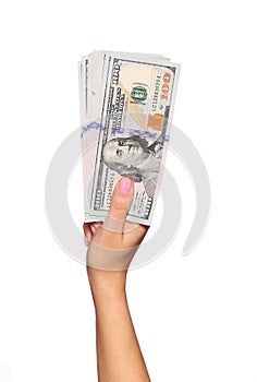 Dollars bills in female hand isolated. Money