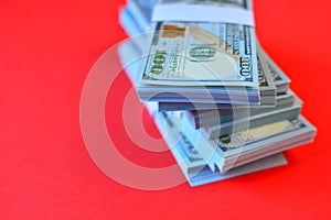 Dollars  bundles on a red background.