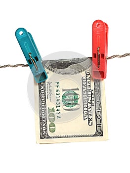 Dollars on clothes-peg