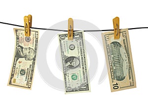 Dollars hang on clothes-peg