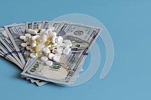 Dollars pills medicine. Prescription medicine on dollars for pharmaceutical industry concept of high cost for healthcare