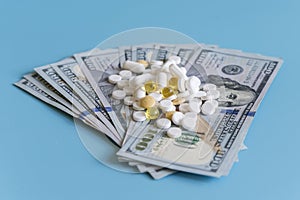 dollars pills medicine. Prescription medicine on dollars for pharmaceutical industry concept of high cost for healthcare and medic