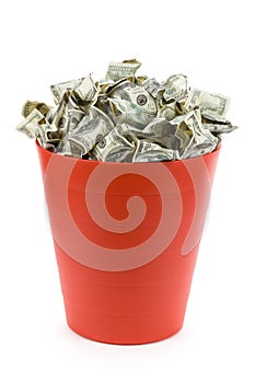 Dollars in Red Garbage Can