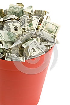 Dollars in Red Garbage Can