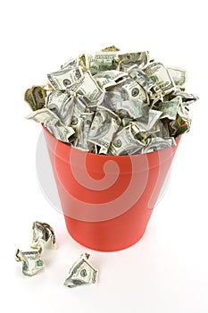 Dollars in Red Garbage Can