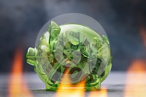 Dollars in a transparent piggy bank surrounded by fire, the concept of inflation and combustion of deposits