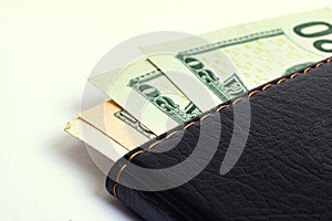 Dollars in wallet isolated on white background