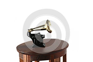 Dollhouse interior - gramophone on a table isolated on white background