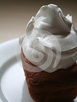 Dollop of cream on cake