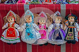 Dolls dressed in traditional Hungarian and Romanian folk costume