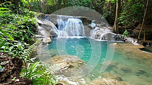 Dolly shot of deep forest waterfall, Kanchanaburi, Thailand