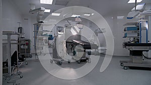 Dolly shot of modern operating block with advanced equipment for surgery