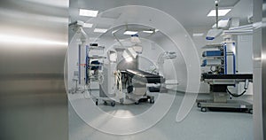 Dolly shot of modern operating room with advanced equipment for surgery