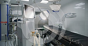 Dolly shot of operating room with advanced equipment for surgery