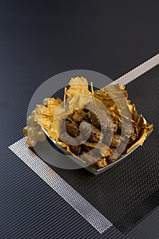 Dolma on metal and carbon background