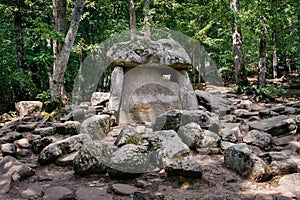 Ancient stone dolmen in the forest