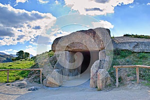 Dolmen de Menga - exterior of megalithic burial tumulus. One of the largest known ancient megalithic structures in Europe