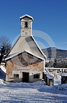 Dolomite chapel and snow