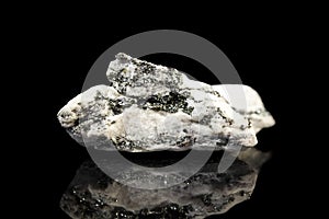 Dolomite gemstone with pyrite, black background