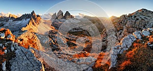 Dolomites mountain panorama in Italy at sunset - Tre Cime di Lav photo