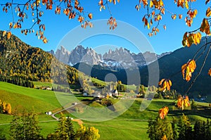 Dolomites mountain village in autumn photo