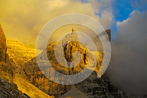 Dolomites rocky mountain wall in sunset light