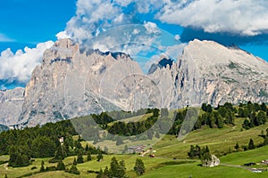 Dolomites Seiser Alm, Alpe di Suisi, South Tyrol, Italy. Beautiful Landscape with Rocky Mountains of Dolomites and Green Meadows 