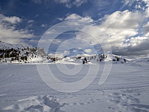 Dolomites snow panorama wooden hut val badia armentarola