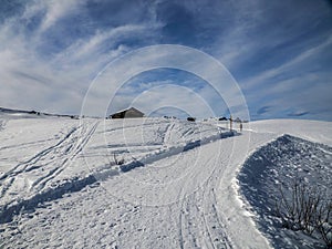 dolomites snow panorama wooden hut val badia armentarola hill