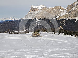 dolomites snow panorama wooden hut val badia armentarola hill