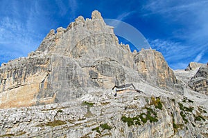 Rocky cliffs tower of Dolomites mountains above the pass, Dolomiti di Brenta