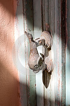 Dolphin door handle, a detail of Rethymno old town, Crete island, Greece