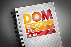 DOM - Document Object Model acronym on notepad, technology concept background