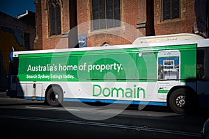 Domain Australia home of property advertisement their website on Sydney metro bus.